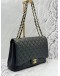 CHANEL CLASSIC MAXI DOUBLE FLAP SHOULDER BAG IN BLACK CAVIAR LEATHER