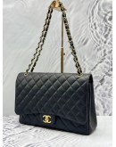 CHANEL CLASSIC MAXI DOUBLE FLAP SHOULDER BAG IN BLACK CAVIAR LEATHER