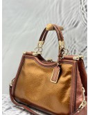 COACH KISSLOCK SADDLE DREAMER TOTE BAG IN METALLIC GOLD WITH BROWN LEATHER