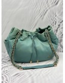 AGNES B. DRAWSTRING BUCKET BAG IN LIGHT BLUE NYLON WITH LEATHER