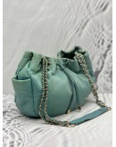 AGNES B. DRAWSTRING BUCKET BAG IN LIGHT BLUE NYLON WITH LEATHER