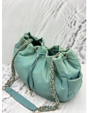 AGNES B. DRAWSTRING BUCKET BAG IN LIGHT BLUE NYLON WITH LEATHER