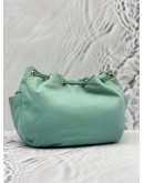 AGNES B. DRAWSTRING BUCKET BAG IN LIGHT BLUE NYLON WITH LEATHER
