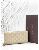 GUCCI ZIP AROUND LONG WALLET IN OFF WHITE GG GUCCISSIMA LEATHER