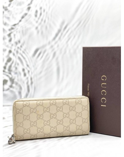 GUCCI ZIP AROUND LONG WALLET IN OFF WHITE GG GUCCISSIMA LEATHER