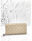 GUCCI ZIP AROUND LONG WALLET IN OFF WHITE GG GUCCISSIMA LEATHER