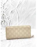 GUCCI ZIP AROUND LONG WALLET IN OFF WHITE GG GUCCISSIMA LEATHER