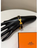 (UNUSED) 2026 HERMES CLIC H BRACELET IN GOLD PLATED WITH BLACK ENAMEL -FULL SET-