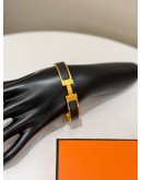 (UNUSED) 2026 HERMES CLIC H BRACELET IN GOLD PLATED WITH BLACK ENAMEL -FULL SET-