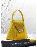 (LIKE NEW) SWAROVSKI WEINSANTO TOP HANDLE BAG IN YELLOW LEATHER 