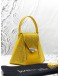 (LIKE NEW) SWAROVSKI WEINSANTO TOP HANDLE BAG IN YELLOW LEATHER 