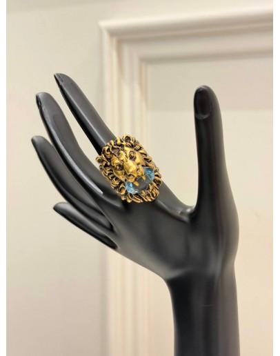 (LIKE NEW) GUCCI LION HEAD RING SIZE 16 IN ANTIQUED GOLD METAL WITH LIGHT BLUE CRYSTAL