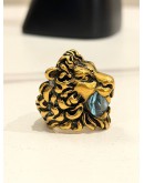 (LIKE NEW) GUCCI LION HEAD RING SIZE 16 IN ANTIQUED GOLD METAL WITH LIGHT BLUE CRYSTAL