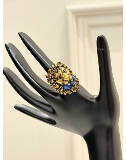 (LIKE NEW) GUCCI LION HEAD RING SIZE 16 IN ANTIQUED GOLD METAL WITH BLUE CRYSTAL