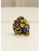 (LIKE NEW) GUCCI LION HEAD RING SIZE 16 IN ANTIQUED GOLD METAL WITH BLUE CRYSTAL