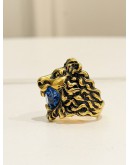 (LIKE NEW) GUCCI LION HEAD RING SIZE 16 IN ANTIQUED GOLD METAL WITH BLUE CRYSTAL