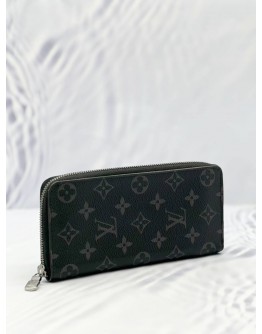 LOUIS VUITTON ZIPPY VERTICAL LONG WALLET IN BLACK MONOGRAM ECLIPSE CANVAS 