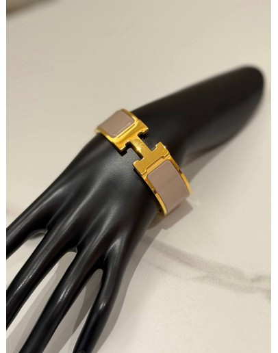 (LIKE NEW) HERMES CLIC CLAC H BRACELET IN YELLOW GOLD PLATED WITH MARRON GLACE ENAMEL