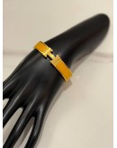 (LIKE NEW) HERMES CLIC H BRACELET IN YELLOW GOLD PLATED WITH JAUNE MADRAS ENAMEL