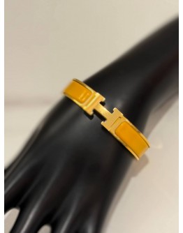(LIKE NEW) HERMES CLIC H BRACELET IN YELLOW GOLD PLATED WITH JAUNE MADRAS ENAMEL