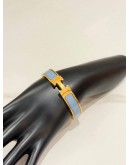 (LIKE NEW) HERMES CLIC H BRACELET IN YELLOW GOLD PLATED WITH BLEU ORAGE ENAMEL