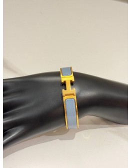 (LIKE NEW) HERMES CLIC H BRACELET IN YELLOW GOLD PLATED WITH BLEU ORAGE ENAMEL