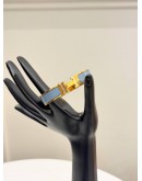 (LIKE NEW) HERMES CLIC H BRACELET IN YELLOW GOLD PLATED WITH BLEU ORAGE ENAMEL