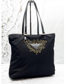 PRADA LOGO GROMMET TOTE BAG IN BLACK NYLON WITH LEATHER