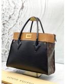 LOUIS VUITTON ON MY SIDE MM TOTE BAG IN BROWN MONOGRAM CANVAS WITH BLACK AND BROWN LEATHER