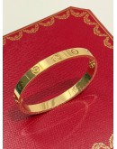 (UNUSED) 2022 CARTIER LOVE BRACELET SIZE 15 IN 18K 750 YELLOW GOLD -FULL SET-