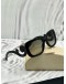 PRADA BAROQUE SUNGLASSES IN BLACK