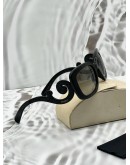 PRADA BAROQUE SUNGLASSES IN BLACK