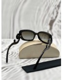PRADA BAROQUE SUNGLASSES IN BLACK