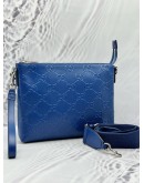 GUCCI WRISTLET MESSENGER BAG IN BLUE GG EMBOSSED LEATHER
