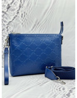 GUCCI WRISTLET MESSENGER BAG IN BLUE GG EMBOSSED LEATHER