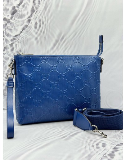 GUCCI WRISTLET MESSENGER BAG IN BLUE GG EMBOSSED LEATHER