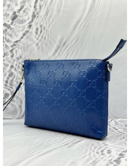GUCCI WRISTLET MESSENGER BAG IN BLUE GG EMBOSSED LEATHER