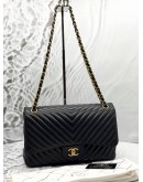 CHANEL JUMBO CLASSIC CHEVRON DOUBLE FLAP BAG IN BLACK LAMBSKIN LEATHER