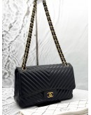 CHANEL JUMBO CLASSIC CHEVRON DOUBLE FLAP BAG IN BLACK LAMBSKIN LEATHER