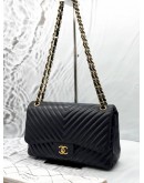 CHANEL JUMBO CLASSIC CHEVRON DOUBLE FLAP BAG IN BLACK LAMBSKIN LEATHER