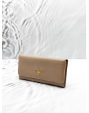 PRADA LONG FLAP WALLET IN BEIGE SAFFIANO LEATHER