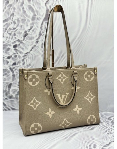 (LIKE NEW) MICROCHIP LOUIS VUITTON ON THE GO MM IN TOURTERELLE WITH CREME MONOGRAM EMPREINTE LEATHER