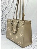 (LIKE NEW) MICROCHIP LOUIS VUITTON ON THE GO MM IN TOURTERELLE WITH CREME MONOGRAM EMPREINTE LEATHER