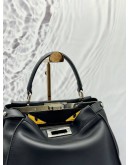FENDI PEEKABOO ISEEU MEDIUM MONSTER EYES TOP HANDLE BAG IN BLACK LEATHER