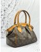 (CLEAR STOCK) LOUIS VUITTON TIVOLI PM IN BROWN MONOGRAM CANVAS
