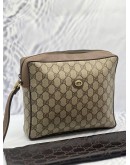 GUCCI CLUTCH IN BEIGE GG SUPREME CANVAS WITH BROWN LEATHER