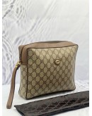 GUCCI CLUTCH IN BEIGE GG SUPREME CANVAS WITH BROWN LEATHER
