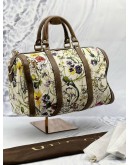 GUCCI MEDIUM JOY INFINITY FLORA BOSTON TOP HANDLE BAG IN MULTICOLOR FLORA PRINT CANVAS WITH DARK BROWN CALFSKIN LEATHER