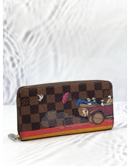 LOUIS VUITTON CHRISTMAS ANIMATION COLLECTION ZIPPY WALLET IN BROWN DAMIER EBENE CANVAS