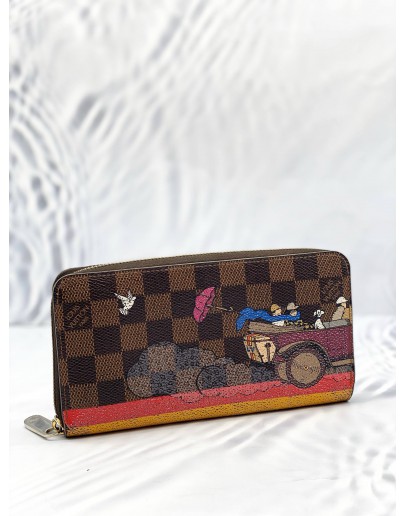 LOUIS VUITTON CHRISTMAS ANIMATION COLLECTION ZIPPY WALLET IN BROWN DAMIER EBENE CANVAS